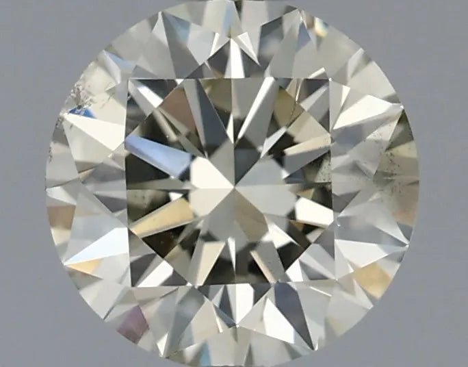0.70ct Round Natural Diamond (Colour K, Clarity SI1, Cut EX, IGI Certified)